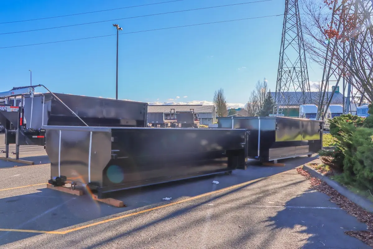 Roll-off dumpster ready for waste disposal at job site for 3 Yard Dumpster Rental in Whitney